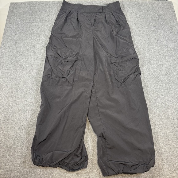 Nike Pants - Nike Pants Womens Large Black Sportswear Tech Pack Repel Athletic Windbreaker